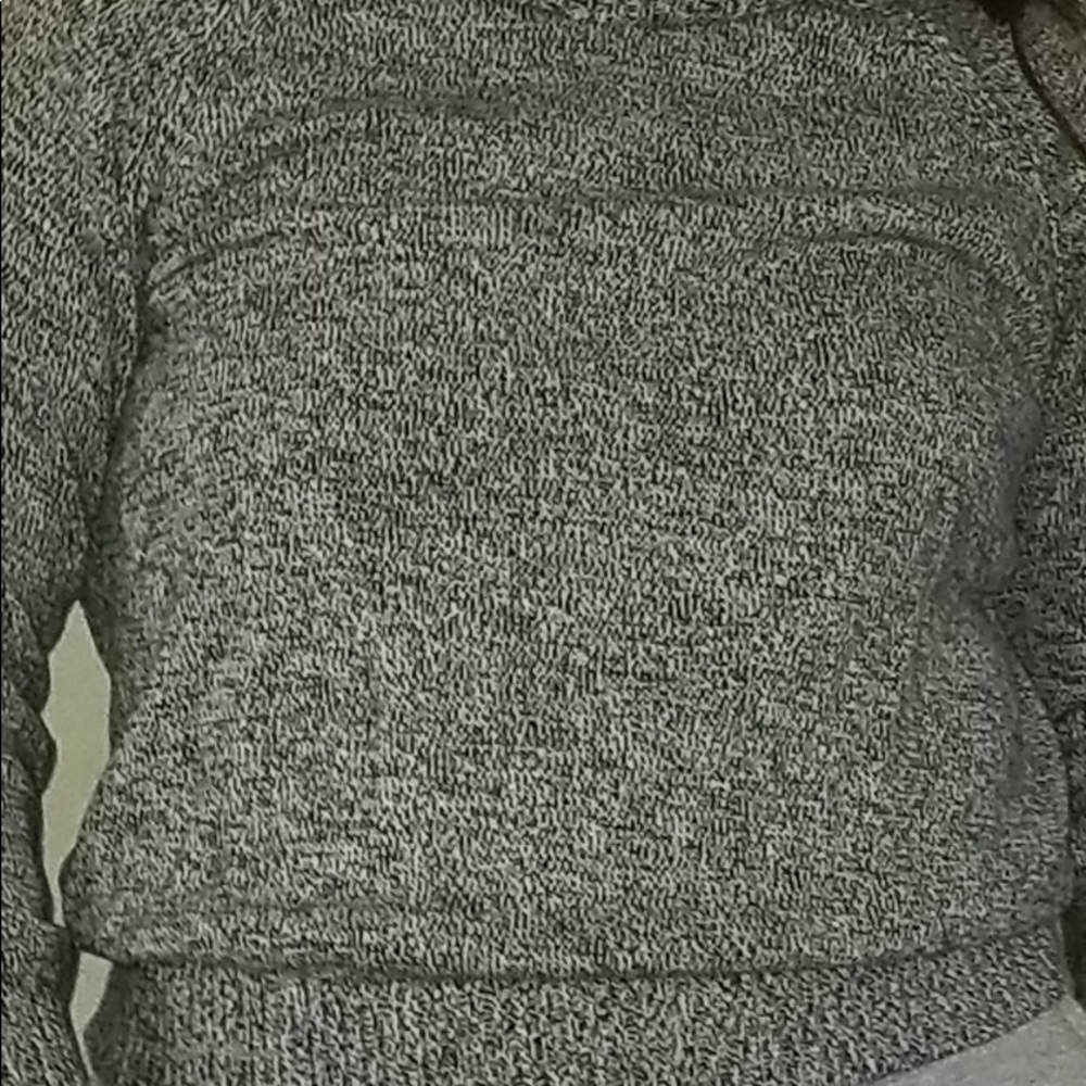 Black and white turtleneck sweater.